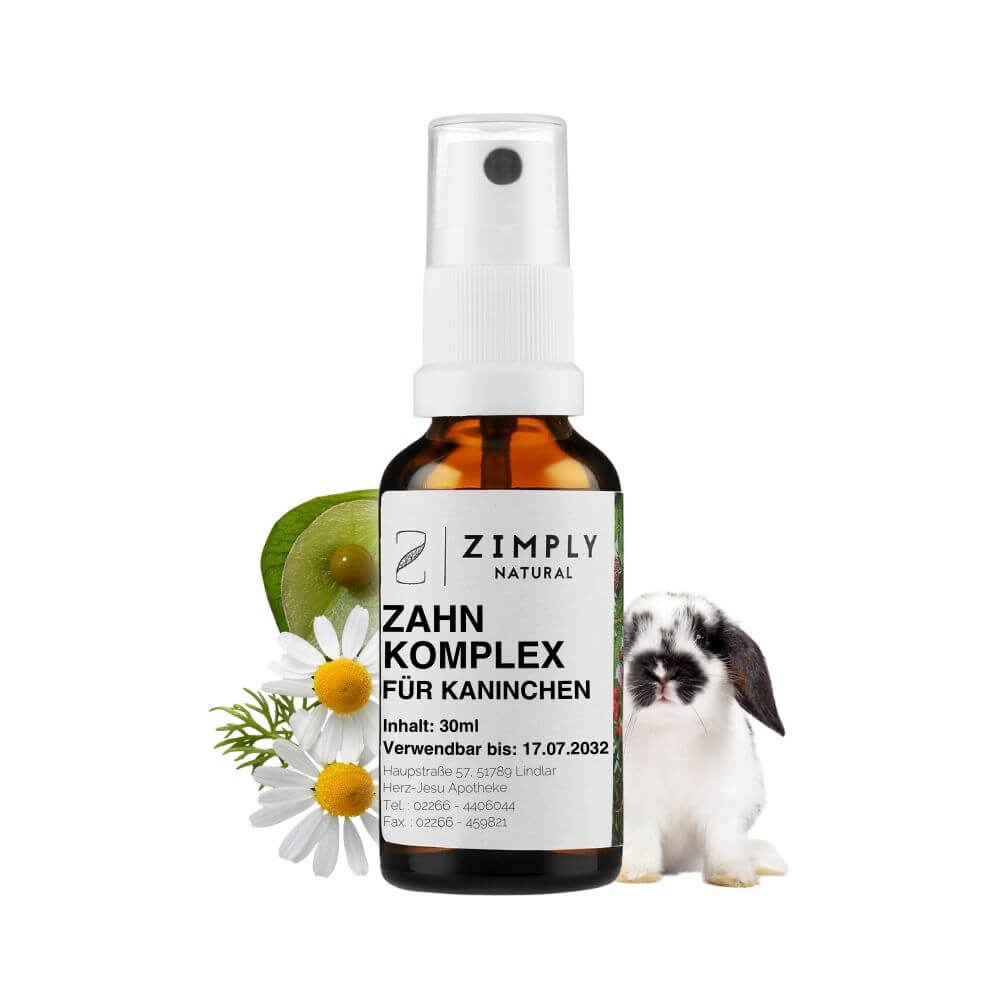 Tooth complex for rabbits as a brown flake with spray head from Zimply Natural with a white rabbit and medicinal plants in the background such as silicic acid, balloon plant, calcium phosphate, calcium sulphate, true camomile