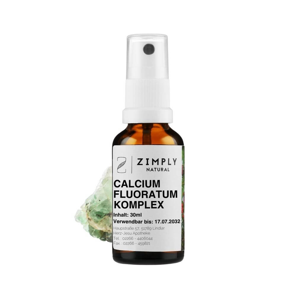 Calcium fluoratum Komplex als Braunes Flaeschchen mit Spruehkopf von Zimply Natural mit Calcium fluoratum im Hintergrund